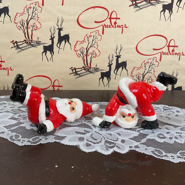 Vintage Ceramic Fitz and Floyd 1976 Tumbling Santa Claus Christmas Figurines Pair