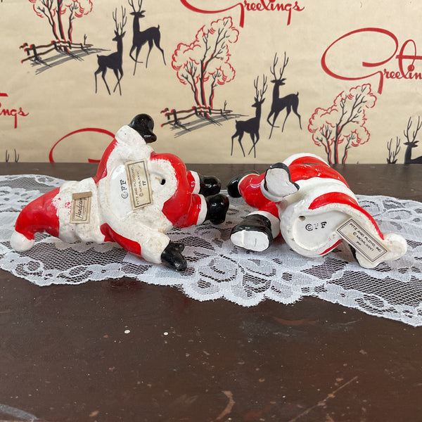 Vintage Ceramic Fitz and Floyd 1976 Tumbling Santa Claus Christmas Figurines Pair