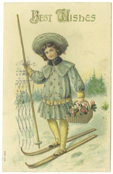 Antique Best Wishes Greetings Postcard 1910s Boy on Snow Skies Basket of Flowers - Avid Vintage