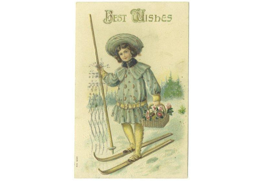 Antique Best Wishes Greetings Postcard 1910s Boy on Snow Skies Basket of Flowers - Avid Vintage