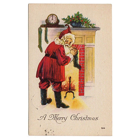 Vintage 1910s Santa Claus Postcard Filling Stocking at Fireplace - Avid Vintage