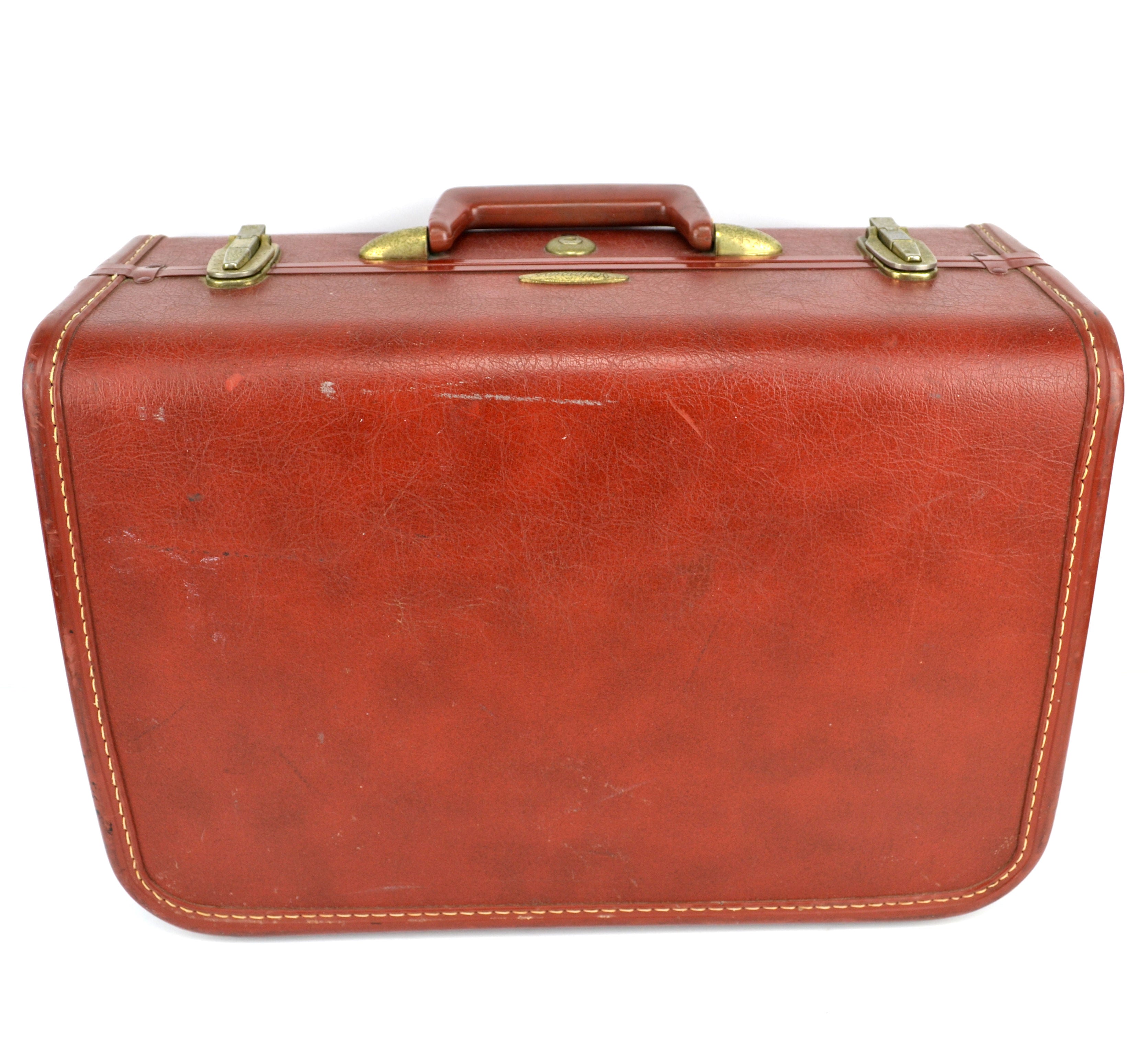 red leather luggage